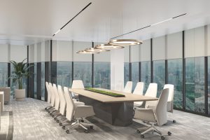 Sophisticated industrial office interior featuring slim-profile glass partitions and light oak wall slats