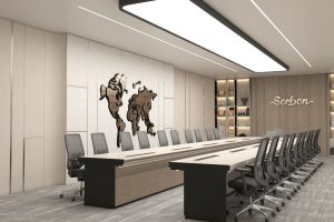 Modern high-tech conference room design with a minimalist long table and architectural ring chandeliers.
